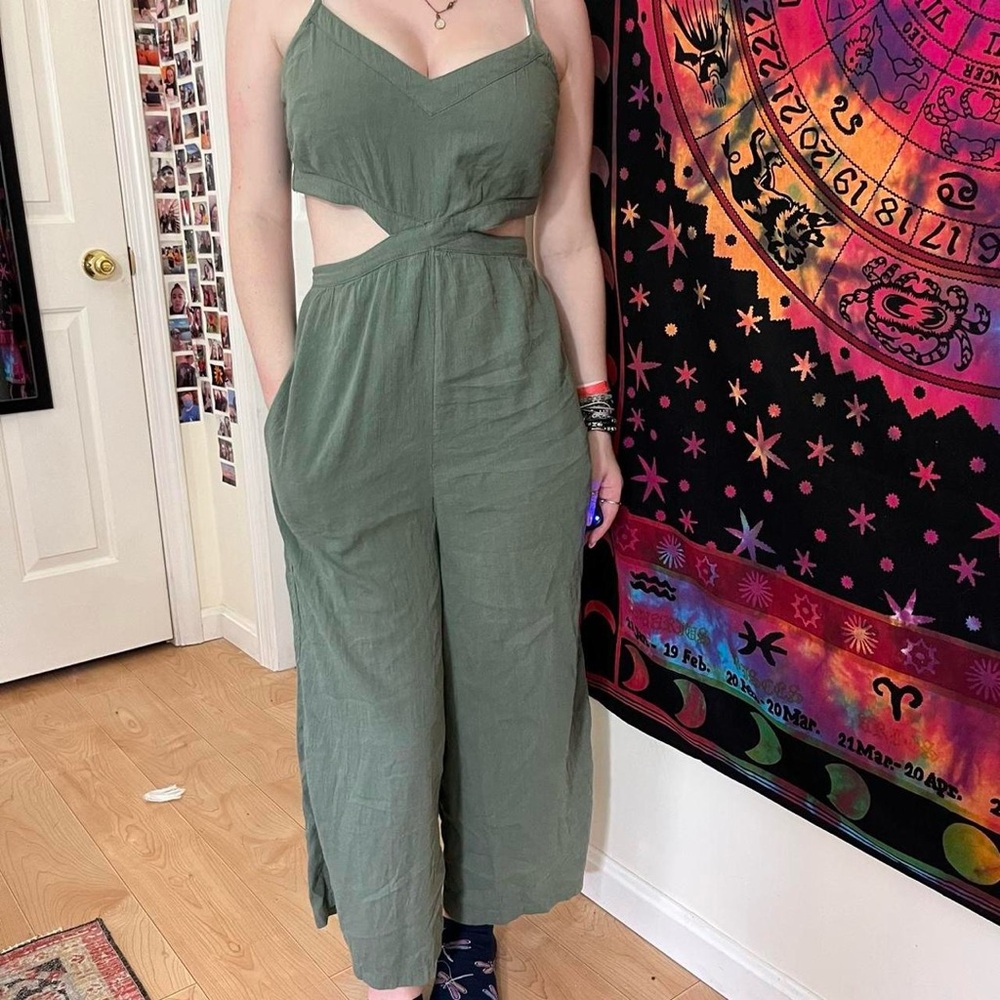 aerie Women's sage Green flowy wide leg Jumpsuit with cut outs on the side